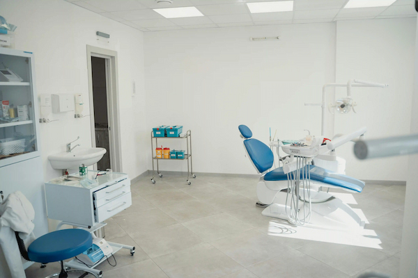 Modern dental office with blue chair